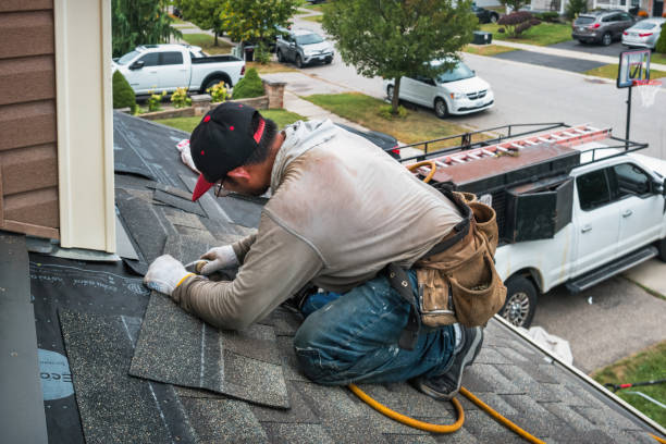 Professional Roofing technician working in Village of the Branch, NY